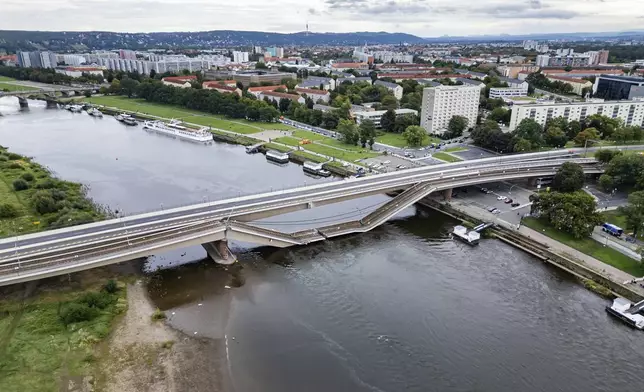 FILE - Parts of the Carola Bridge over the Elbe have collapsed in Dresden, Germany, Wednesday, Sept. 11, 2024. (Robert Michael/dpa via AP, File)