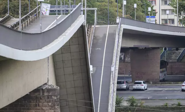 FILE - Parts of the Carola Bridge over the Elbe is seen collapsed in Dresden, eastern Germany, Wednesday, Sept. 11, 2024. (Robert Michael/dpa via AP, File)