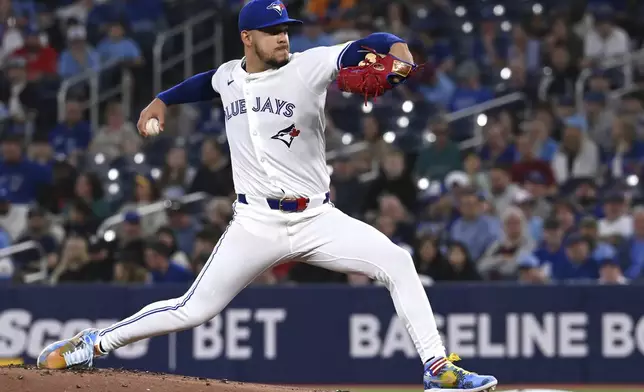 Toronto Blue Jays starting pitcher Jose Berrios throws to a Seattle Mariners batter in first-inning baseball game action in Toronto, Saturday, April 19, 2025. (Jon Blacker/The Canadian Press via AP)
