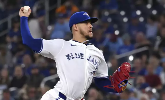 Toronto Blue Jays starting pitcher Jose Berrios throws to a Seattle Mariners batter in first-inning baseball game action in Toronto, Saturday, April 19, 2025. (Jon Blacker/The Canadian Press via AP)