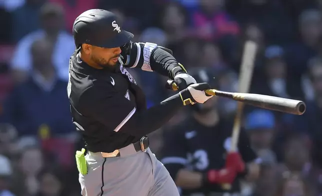 Chicago White Sox's Edgar Quero hits a two-run single in the seventh inning of a baseball game against the Boston Red Sox, Sunday, April 20, 2025, in Boston. (AP Photo/Steven Senne)