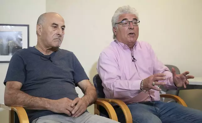 Yunice Abbas, left, one of the men accused in the 2016 armed robbery of Kim Kardashian and Thierry Niemen, co-author of the book "I Sequestered Kim Kardashian", answer the Associated Press, Tuesday, April 22, 2025 in Paris. (AP Photo/Thibault Camus)