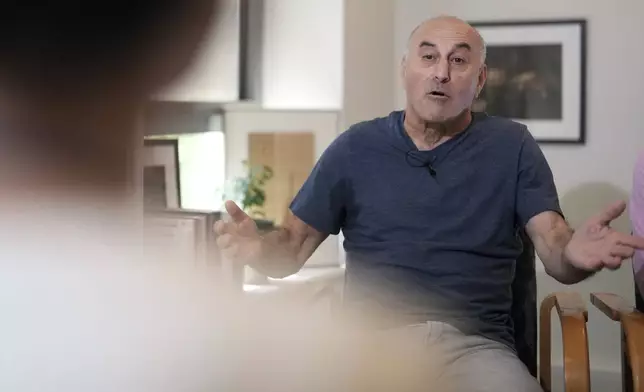 Yunice Abbas, one of the men accused in the 2016 armed robbery of Kim Kardashian, reacts during an interview with the Associated Press, Tuesday, April 22, 2025 in Paris. (AP Photo/Thibault Camus)