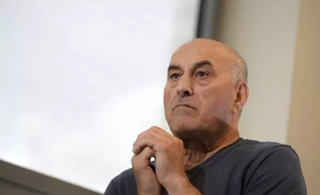 Yunice Abbas, one of the men accused in the 2016 armed robbery of Kim Kardashian, reacts during an interview with the Associated Press, Tuesday, April 22, 2025 in Paris. (AP Photo/Thibault Camus)