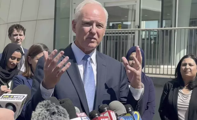 In this image taken from video, immigration lawyer Charles Kuck speaks to reporters outside a federal courthouse in Atlanta, on April 17, 2025. (AP Photo/Kate Brumback)