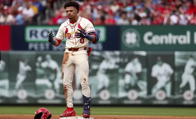 St. Louis Cardinals' Masyn Winn reacts after hitting a double during the fourth inning of a baseball game against the Milwaukee Brewers, Saturday, April 26, 2025, in St. Louis. (AP Photo/Scott Kane)