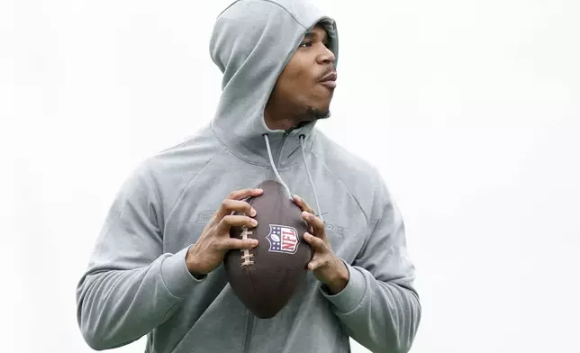 FILE - Penn State defensive lineman Abdul Carter throws during the school's NFL football pro day, Friday, March 28, 2025, in State College, Pa. (AP Photo/Matt Freed,File)