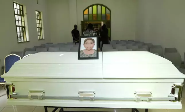 The casket for Ladi Anzaki Olubunmi, a TikTok content moderator employed by subcontractor Teleperformance, at Chiromo Funeral Parlour in Nairobi, Kenya Thursday, April. 17, 2025. (AP Photo/Brian Inganga)