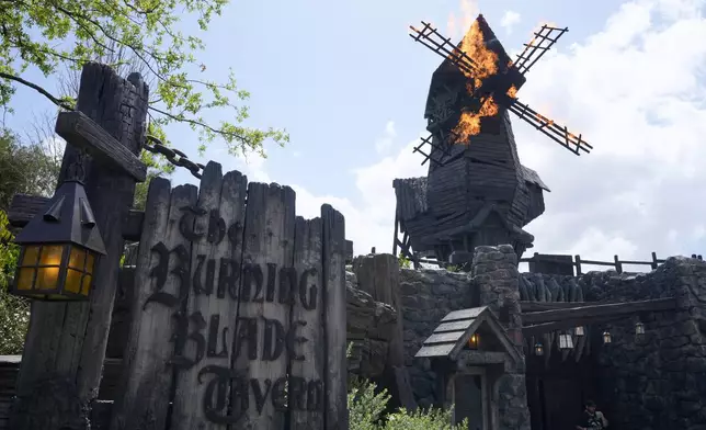 Entrance to the Burning Blade Tavern is seen in Dark Universe at Epic Universe at Universal Resort Orlando Thursday, April 10, 2025, in Orlando, Fla. (AP Photo/John Raoux)