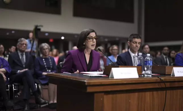 Former Justice Department attorneys Liz Oyer and Ryan Crosswell, testify before the House and Senate Judiciary Committee members during a hearing on the Justice Department under President Donald Trump, on Capitol Hill in Washington, Monday, April 7, 2025. (AP Photo/J. Scott Applewhite)