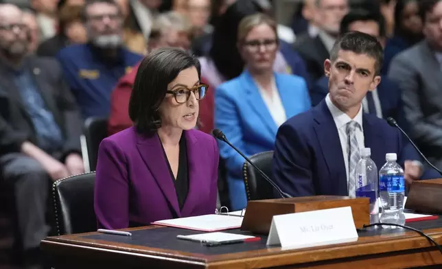 Former Justice Department attorneys Liz Oyer, left, and Ryan Crosswell participate in a hearing on the Justice Department on Capitol Hill in Washington, Monday, April 7, 2025. (AP Photo/J. Scott Applewhite)