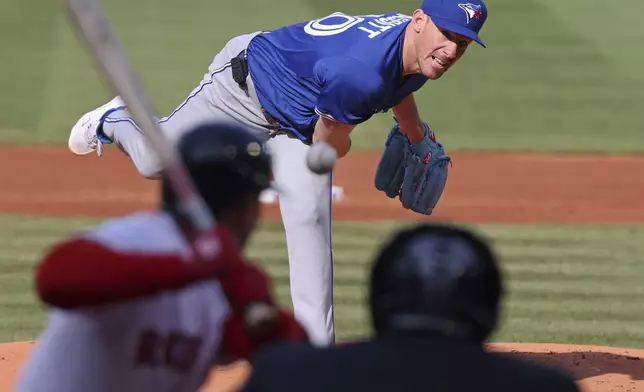 Toronto Blue Jays pitcher Chris Bassitt throws during the first inning of a baseball game against the Boston Red Sox, Thursday, April 10, 2025, in Boston. (AP Photo/Jim Davis)