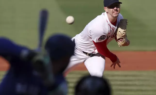Boston Red Sox pitcher Walker Buehler throws during the first inning of a baseball game against the Toronto Blue Jays, Thursday, April 10, 2025, in Boston. (AP Photo/Jim Davis)