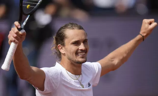 Germany's Alexander Zverev celebrates after winning the tennis final match against Ben Shelton of the US at the ATP Tour in Munich, Germany, Sunday, April 20, 2025. (AP Photo/Matthias Schrader)