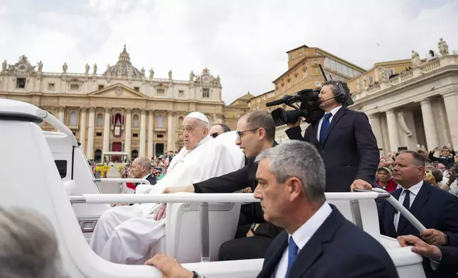 Pope Francis tours St. Peter's Square in his popemobile after bestowing the Urbi et Orbi (Latin for to the city and to the world) blessing at the end of the Easter mass presided over by Cardinal Angelo Comastri in St. Peter's Square at the Vatican Sunday, April 20, 2025.(AP Photo/Andrew Medichini)