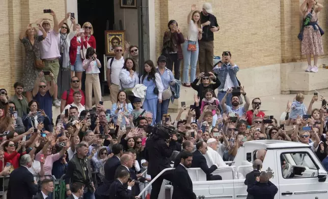 Pope Francis tours the crowd at the end of the Easter mass in St. Peter's Square at the Vatican Sunday, April 20, 2025. Francis died Monday, April 21, 2025. (AP Photo/Gregorio Borgia)