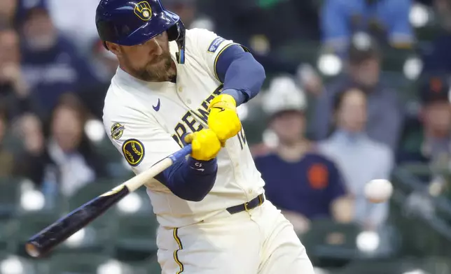 Milwaukee Brewers' Rhys Hoskins hits a home run against the Detroit Tigers during the third inning of a baseball game, Wednesday, April 16, 2025, in Milwaukee. (AP Photo/Jeffrey Phelps)