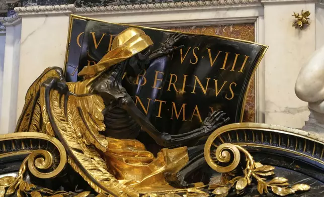 The recent restoration of the funerary monument of Urban VIII is displayed to journalists inside St. Peter's Basilica at the Vatican, Friday, April 11, 2025. (AP Photo/Gregorio Borgia)