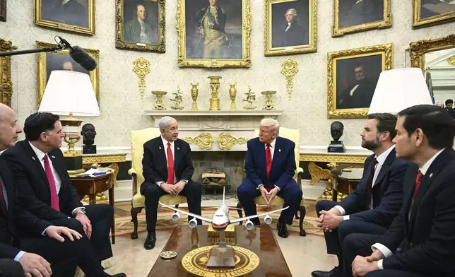 President Donald Trump, center right, meets with Israel's Prime Minister Benjamin Netanyahu, center left, as Secretary of State Marco Rubio, from right, and Vice President JD Vance listen in the Oval Office at the White House in Washington, Monday, April 7, 2025. (Pool via AP)