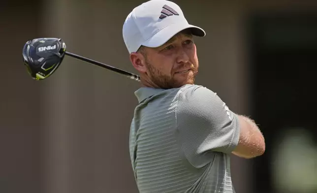Daniel Berger watches his drive on the third hole during the final round of the RBC Heritage golf tournament, Sunday, April 20, 2025, in Hilton Head Island, S.C. (AP Photo/Mike Stewart)