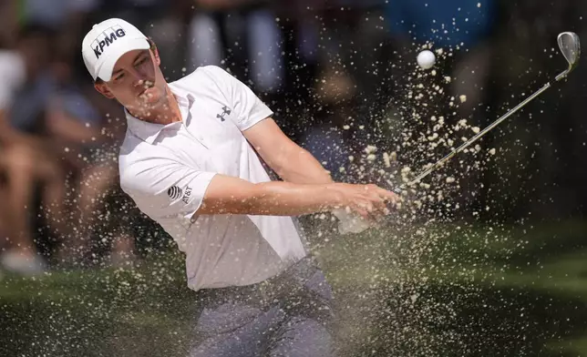 Maverick McNealy hits out of the bunker on the seventh hole during the final round of the RBC Heritage golf tournament, Sunday, April 20, 2025, in Hilton Head Island, S.C. (AP Photo/Mike Stewart)