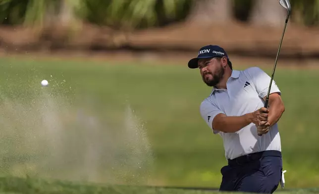 Andrew Novak hits from the bunker on the seventh hole during the final round of the RBC Heritage golf tournament, Sunday, April 20, 2025, in Hilton Head Island, S.C. (AP Photo/Mike Stewart)