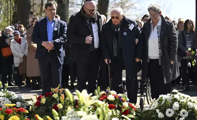 Albrecht Weinberg, second from right, attends a memorial service and wreath-laying ceremony marking the 80th anniversary of the liberation the Mittelbau-Dora concentration camp in Nordhausen, Germany, Monday, April 7, 2025. (Martin Schutt/dpa via AP)