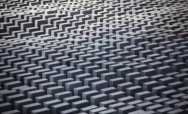 FILE - General view of the Memorial for the murdered Jews of Europe, the so called Holocaust Memorial in central Berlin, Germany, June 17, 2011. (AP Photo/Markus Schreiber, File)