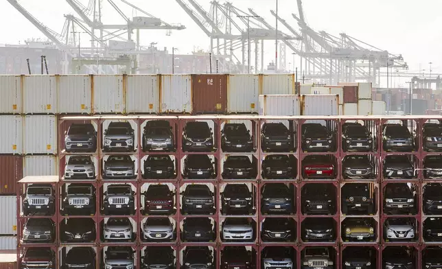 Vehicles line a shipping terminal at the Port of Oakland on Tuesday, April 15, 2025, in Oakland, Calif. (AP Photo/Noah Berger)