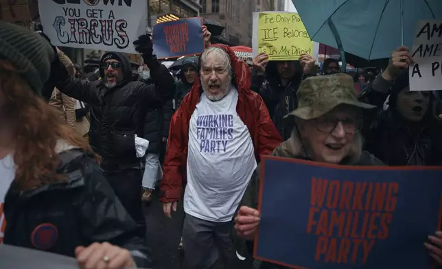 A demonstrator shouts slogans during a "Hands Off!" protest against President Donald Trump on Saturday, April 5, 2025, in New York. (AP Photo/Andres Kudacki)