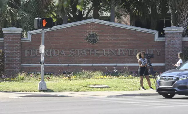 A Florida State University sign is displayed in Tallahassee, Fla., Thursday, April 17, 2025. (AP Photo/Gary McCullough)
