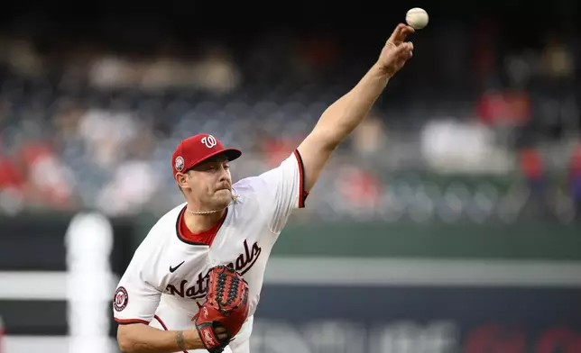 Washington Nationals starting pitcher Mitchell Parker throws during the first inning of a baseball game against the Baltimore Orioles, Tuesday, April 22, 2025, in Washington. (AP Photo/Nick Wass)