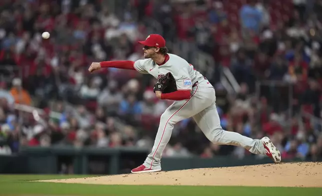 Philadelphia Phillies starting pitcher Aaron Nola throws during the first inning of a baseball game against the St. Louis Cardinals Friday, April 11, 2025, in St. Louis. (AP Photo/Jeff Roberson)