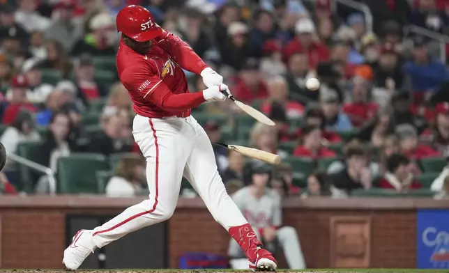 St. Louis Cardinals' Jordan Walker breaks his bat flying out during the third inning of a baseball game against the Philadelphia Phillies Friday, April 11, 2025, in St. Louis. (AP Photo/Jeff Roberson)