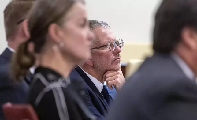 Greg MacKenzie, attorney for the Hackman children, listens to Judge Matthew J. Wilson in District Court regarding the release of public records in the deaths of actor Gene Hackman and his wife, Betsy Arakawa in Santa Fe, N.M., Monday, March 31, 2025. (Michael G. Seamans/Santa Fe New Mexican via AP, Pool)