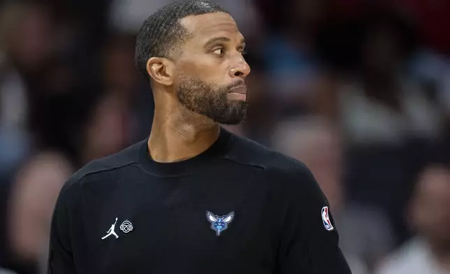 Charlotte Hornets head coach Charles Lee looks on during the first half of an NBA basketball game against the Chicago Bulls, Sunday, April 6, 2025, in Charlotte, N.C. (AP Photo/Jacob Kupferman)