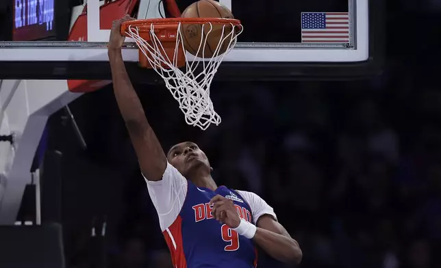 Detroit Pistons forward Ausar Thompson (9) dunks the ball in the second half during Game 5 in an NBA basketball first-round playoff series against the New York Knicks, Tuesday, April 29, 2025, in New York. (AP Photo/Adam Hunger)