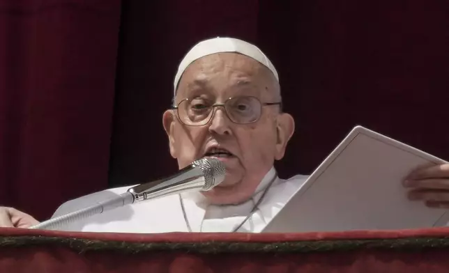 Pope Francis appears on the central lodge of St. Peter's Basilica to bestow the Urbi et Orbi (Latin for to the city and the world) blessing at the end of the Easter mass presided over by Cardinal Angelo Comastri in St. Peter's Square at the Vatican Sunday, April 20, 2025. (AP Photo/Andrew Medichini)