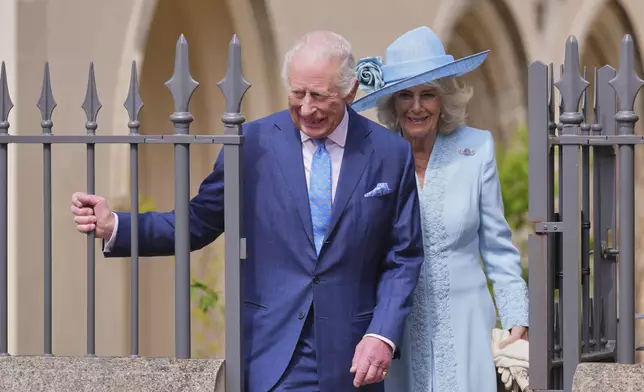 Britain's King Charles III and Queen Camilla leave after attending the Easter Matins Service at St. George's Chapel, Windsor Castle, England, Sunday, April 20, 2025. (AP Photo/Kirsty Wigglesworth, Pool)