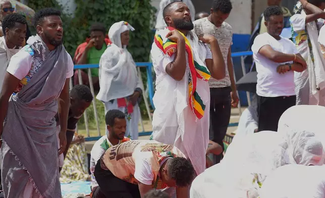Ethiopian Orthodox devotees gather to pray during Easter celebrations at St. John Orthodox Tewahedo Church in Addis Ababa, Ethiopia, Friday, April 18, 2025. (AP Photo)