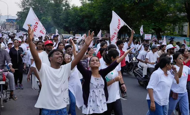 Christians participate in a "Run for Jesus" rally on the eve of Easter Sunday in Hyderabad, India, Saturday, April 19, 2025. (AP Photo/Mahesh Kumar A.)
