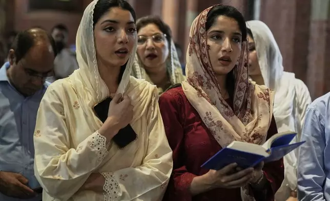 Christians attend an Easter Mass at the Cathedral Church of the Resurrection, in Lahore, Pakistan, Sunday, April 20, 2025. (AP Photo/K.M. Chaudary)