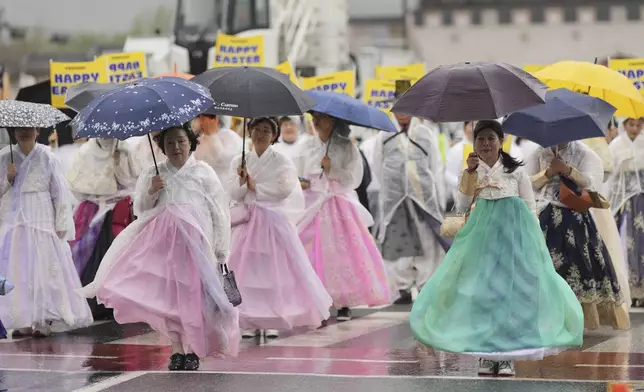 Participants attend the Easter parade in Seoul, South Korea, Saturday, April 19, 2025. (AP Photo/Lee Jin-man)