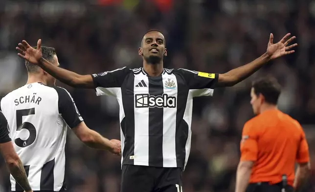 Newcastle United's Alexander Isak celebrates scoring their side's fifth goal of the game during the English Premier League soccer match between Newcastle United and Crystal Palace at St. James' Park, Newcastle upon Tyne, England, Wednesday, April 16, 2025. (Owen Humphreys/PA via AP)