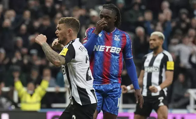 Crystal Palace's Eberechi Eze reacts after missing a penalty during the English Premier League soccer match between Newcastle United and Crystal Palace at St. James' Park, Newcastle upon Tyne, England, Wednesday, April 16, 2025. (Owen Humphreys/PA via AP)