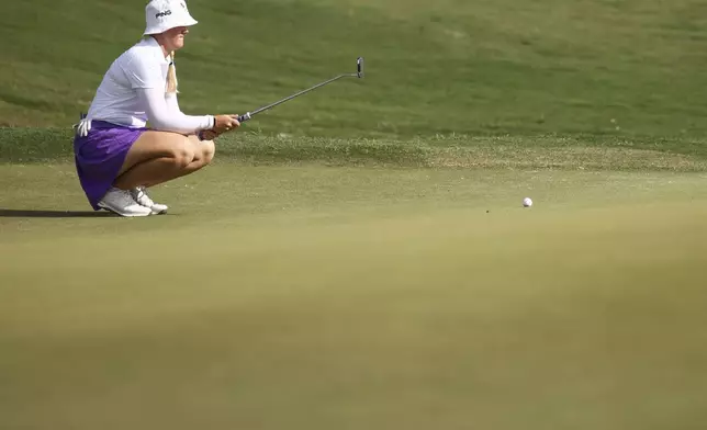 Ingrid Lindblad lines up her putt on the fifteenth green during the final round of the LPGA's JM Eagle LA Championship golf tournament at El Caballero Country Club Sunday, April 20, 2025, in Los Angeles. (AP Photo/Jessie Alcheh)