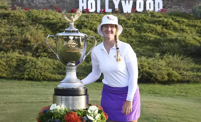 Ingrid Lindblad poses with the trophy after winning the LPGA JM Eagle LA Championship golf tournament at El Caballero Country Club, Sunday, April 20, 2025, in Los Angeles. (AP Photo/Jessie Alcheh)