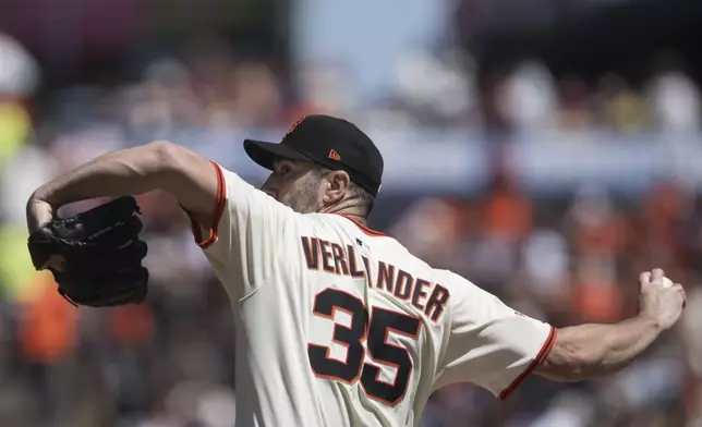 San Francisco Giants pitcher Justin Verlander (35) throws during the third inning of a baseball game against the Cincinnati Reds in San Francisco, Wednesday, April 9, 2025. (AP Photo/Nic Coury)