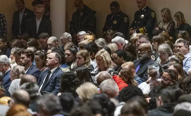 Guest observe 168 Seconds of Silence for victims of the Oklahoma City Bombing during the 30th anniversary memorial service for the victims of the 1995 Oklahoma City bombing, in Oklahoma City, Saturday, April 19, 2025. (AP Photo/Alonzo Adams)