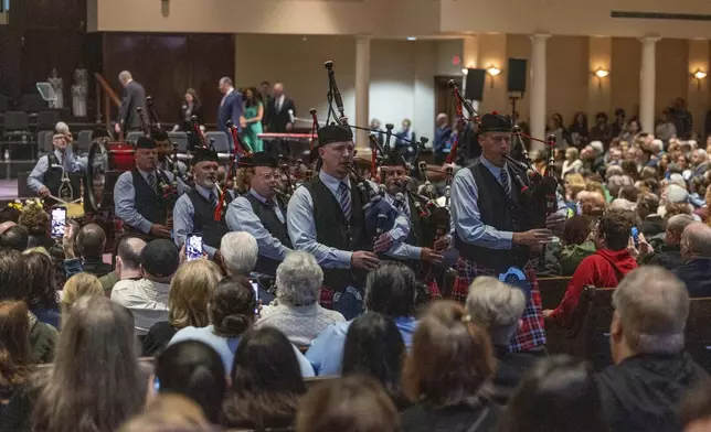 Oklahoma Fire Pipes and Drums start the 30th anniversary memorial service for the victims of the 1995 Oklahoma City bombing, in Oklahoma City, Saturday, April 19, 2025. (AP Photo/Alonzo Adams)